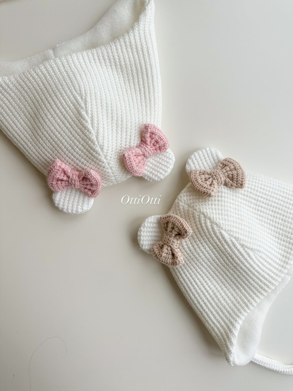 Angora beanie with bows, fleece-lined