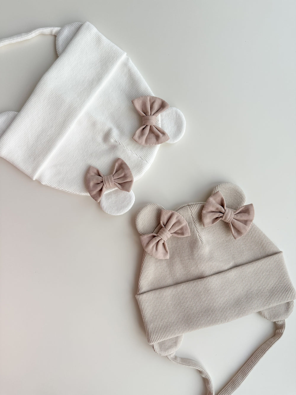 Beanies with bows and ties