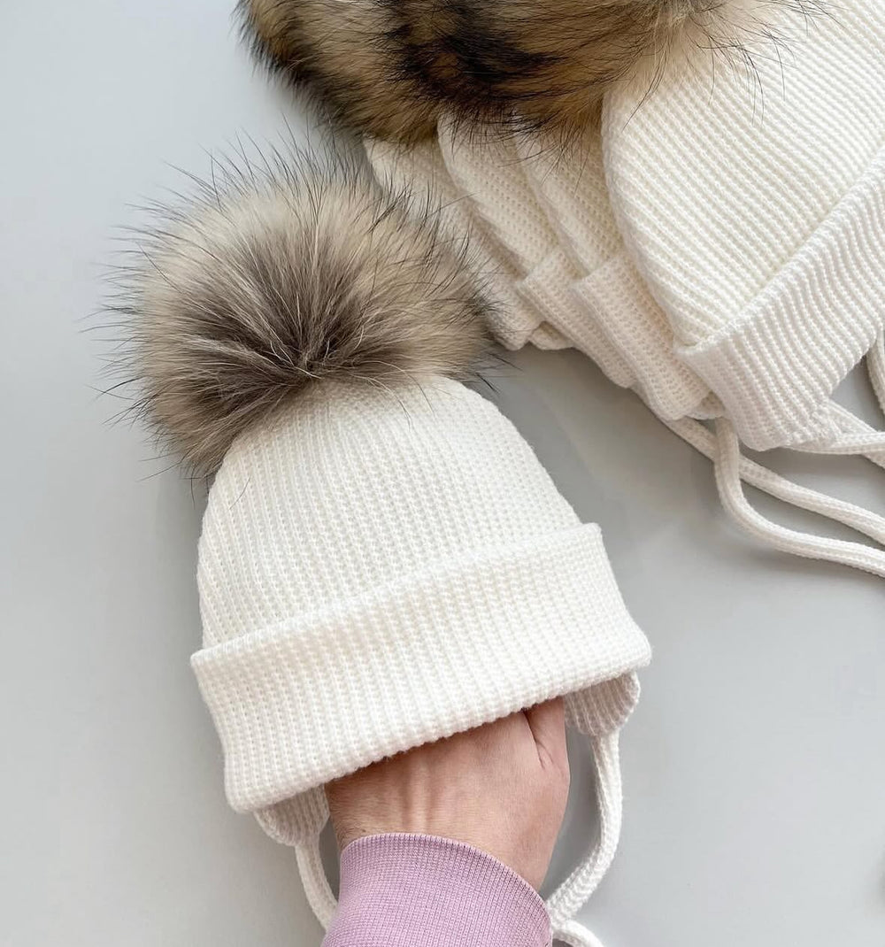White beanie with natural pom-pom